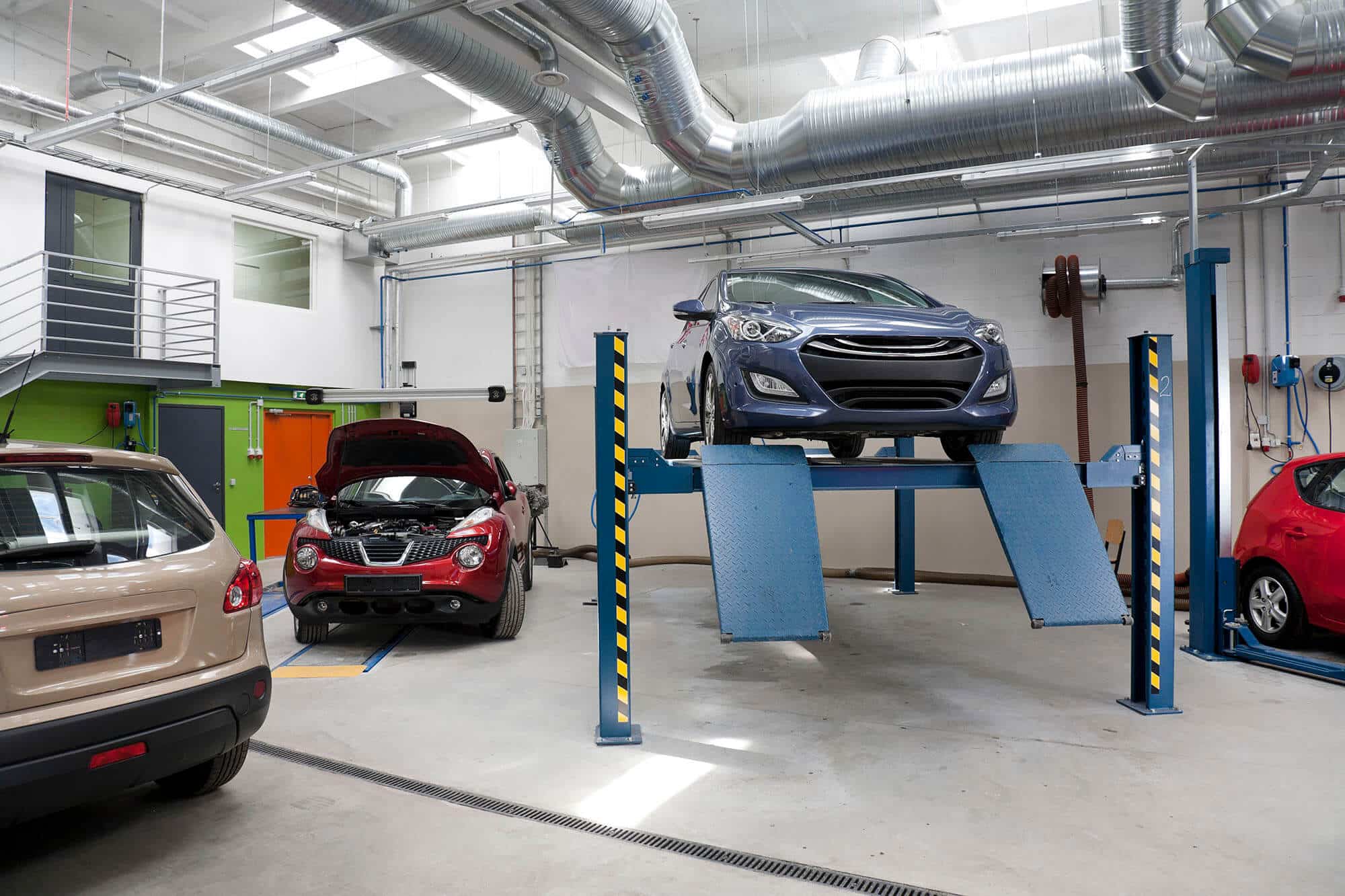 cars-in-a-large-repair-workshop-or-garage-2022-03-04-02-39-13-utc.jpg